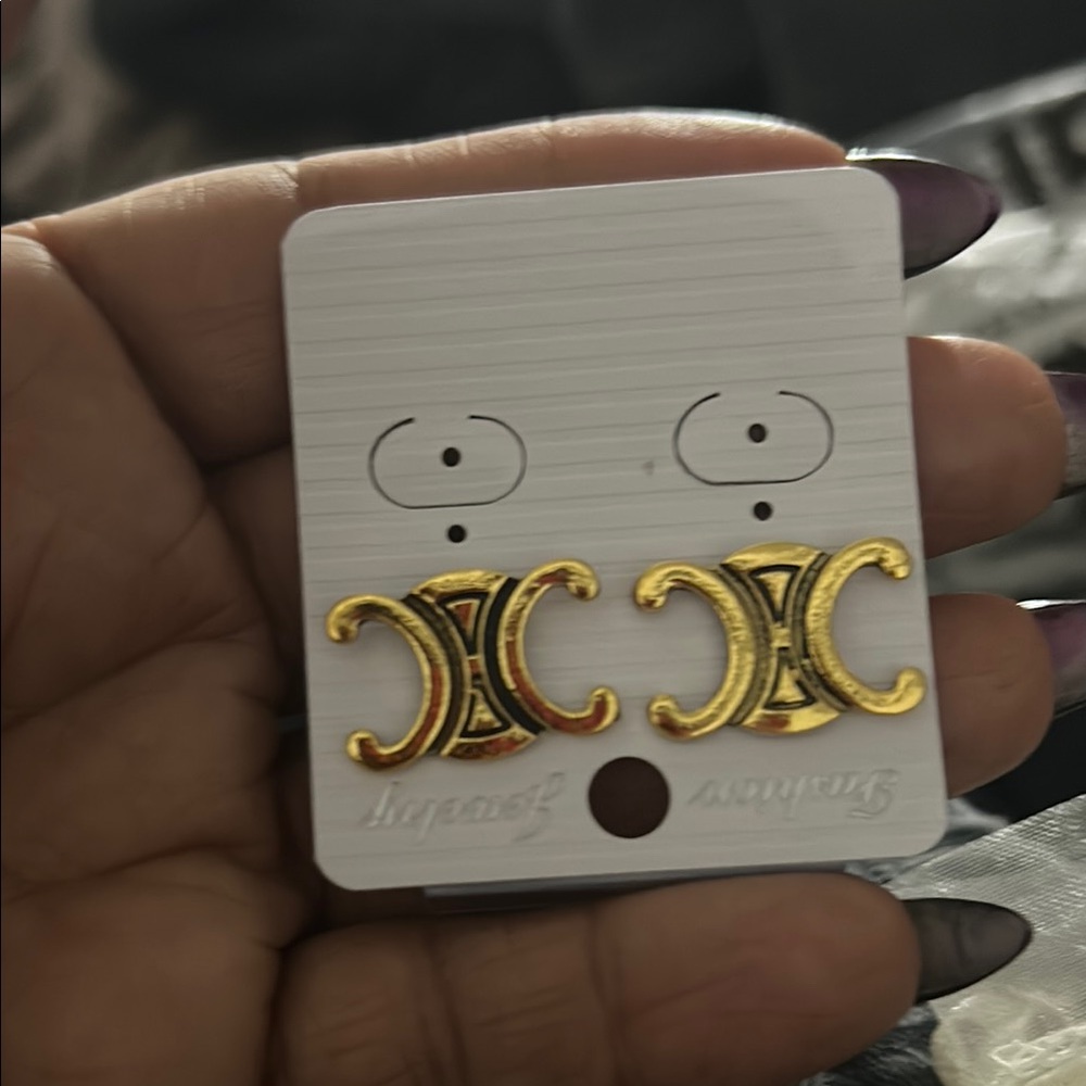 C logo earrings
